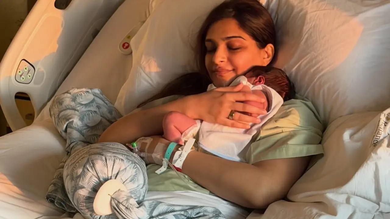 Sonam Kapoor shared the first glimpse of her newborn baby boy from the hospital, posting heartfelt pictures of herself holding the baby and another candid moment. She expressed gratitude and joy after welcoming her second child on March 29, 2026. Read full story here